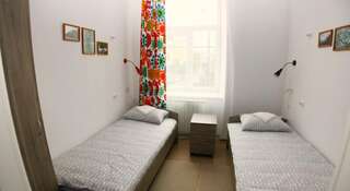 Хостел Три Матрешки на Карла Маркса Иркутск Односпальная кровать в общем номере для мужчин и женщин-2